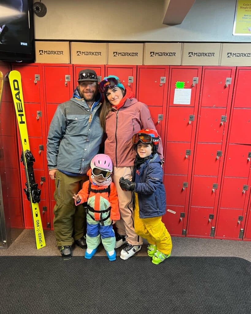 Family with kids by the ski lockers at Vista Bahn Ski Rentals