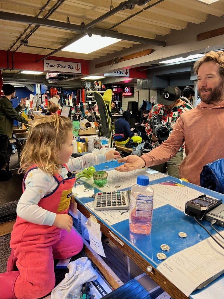Young skier at the Vista Bahn counter in Vail Village